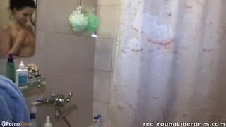Surprised brunette fucked in the shower