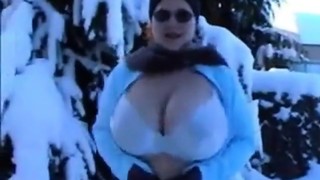 Mature with huge tits flashing in snow