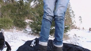 Girl fucks her ass and pussy with dildos in the snow